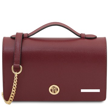 Elegante leren clutch met gouden kettingriem plek van de gravure