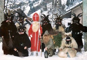 Sinterklaas met zwarte duivels